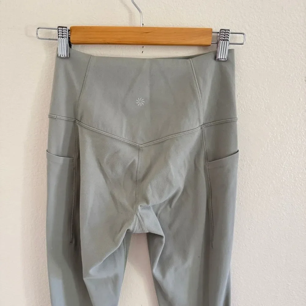 Athleta Salutation Stash Pocket II Cinch Legging Sage S